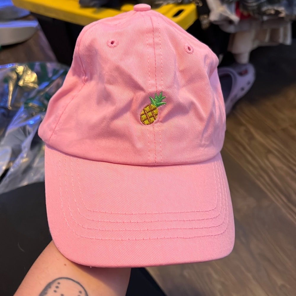 Pink hat with a little pineapple on front
